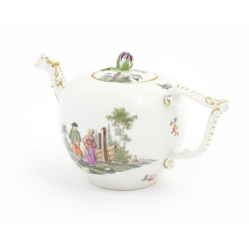 66 - A Meissen teapot decorated with pastoral scenes with figures in a rural landscape. The spout modelle... 