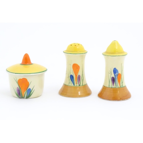 73 - A Clarice Cliff three piece cruet comprising salt, pepper and mustard pot, decorated in the Crocus p... 