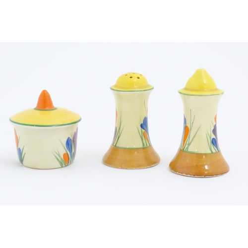 73 - A Clarice Cliff three piece cruet comprising salt, pepper and mustard pot, decorated in the Crocus p... 