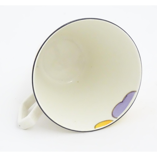 86 - An Art Deco Tams Ware cup and saucer decorated in the Woodland pattern. Together with a limited edit... 