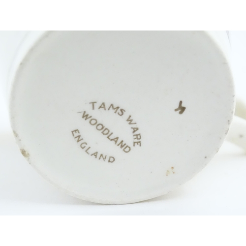 86 - An Art Deco Tams Ware cup and saucer decorated in the Woodland pattern. Together with a limited edit... 