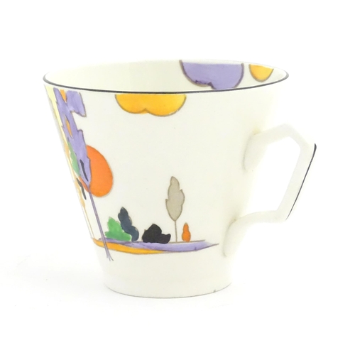 86 - An Art Deco Tams Ware cup and saucer decorated in the Woodland pattern. Together with a limited edit... 