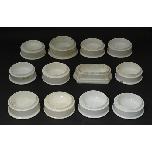 162 - Twelve assorted pot lid bases, one marked Crosse & Blackwell, 21 Soho Square, London. Various sizes.... 