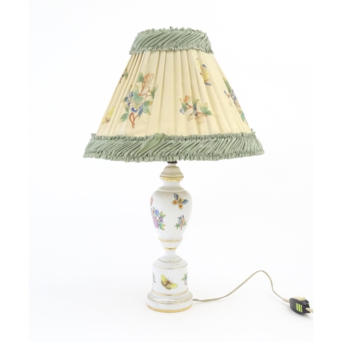 256 - A Herend porcelain table lamp decorated in the Queen Victoria pattern, with original shade. Marked u... 