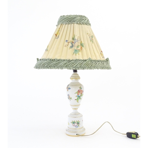 256 - A Herend porcelain table lamp decorated in the Queen Victoria pattern, with original shade. Marked u... 