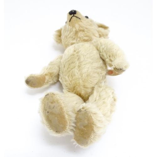 1442 - Toy: A 20thC Past Times mohair teddy bear - Bertie, with stitched nose and mouth, pad paws and artic... 