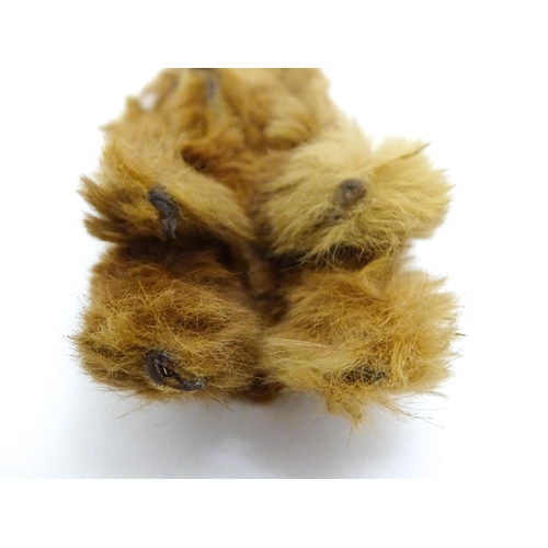 1449 - Toy: A 20thC small plush miniature model of a teddy bear. Approx. 3