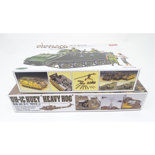 1454 - Toys: Two Academy Hobby Model / scale model kits comprising UH-IC Huey Heavy Hog helicopter, and M11... 