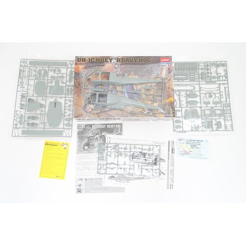 1454 - Toys: Two Academy Hobby Model / scale model kits comprising UH-IC Huey Heavy Hog helicopter, and M11... 