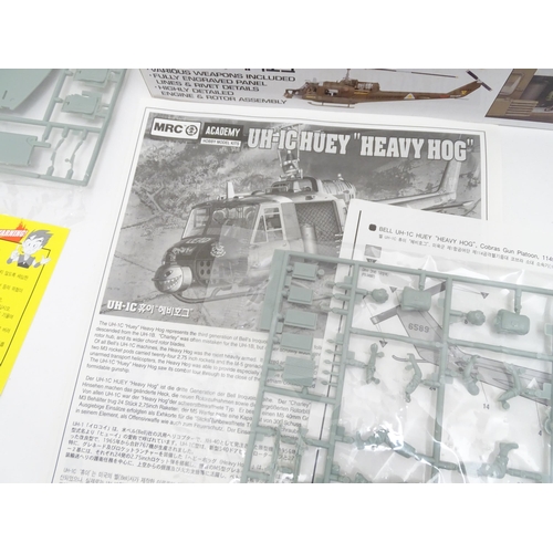 1454 - Toys: Two Academy Hobby Model / scale model kits comprising UH-IC Huey Heavy Hog helicopter, and M11... 