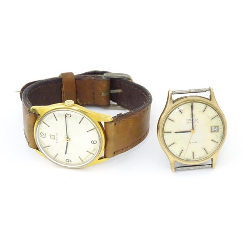 815 - A Gentleman's Tissot automatic wrist watch together with an Omega watch case and movement. each appr... 