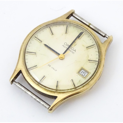 815 - A Gentleman's Tissot automatic wrist watch together with an Omega watch case and movement. each appr... 