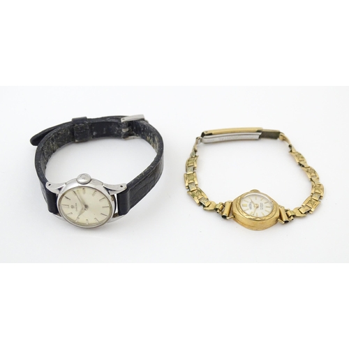 824 - A ladies Omega wind wristwatch together with a 9ct gold cased Gradus ladies wristwatch with gold pla... 