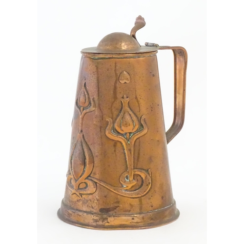 1087 - An Art Nouveau Joseph Sankey & Sons copper hot water jug with embossed floral and foliate decoration... 