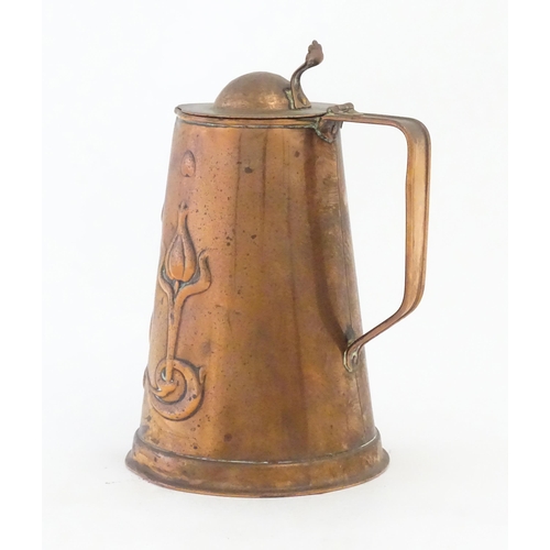 1087 - An Art Nouveau Joseph Sankey & Sons copper hot water jug with embossed floral and foliate decoration... 