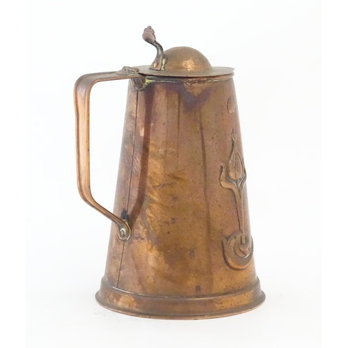 1087 - An Art Nouveau Joseph Sankey & Sons copper hot water jug with embossed floral and foliate decoration... 