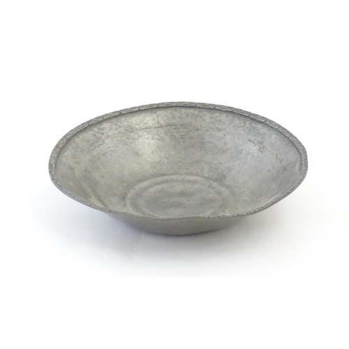 1088 - A Liberty & Co Tudric pewter bowl with scrollwork border. Marked under and numbered 01354. Approx. 9... 