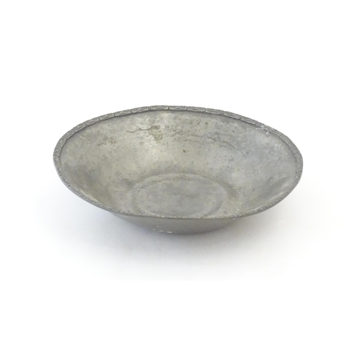 1088 - A Liberty & Co Tudric pewter bowl with scrollwork border. Marked under and numbered 01354. Approx. 9... 