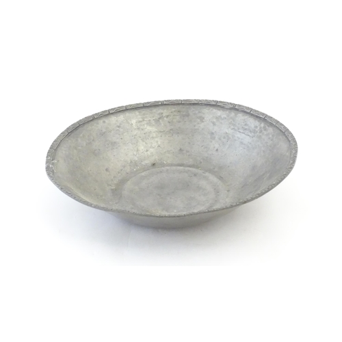 1088 - A Liberty & Co Tudric pewter bowl with scrollwork border. Marked under and numbered 01354. Approx. 9... 