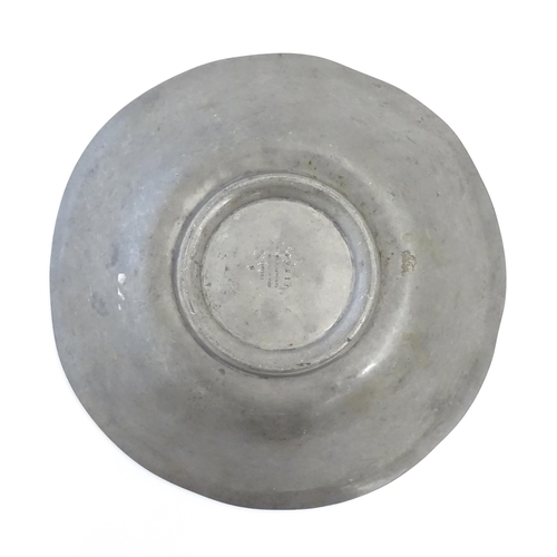 1088 - A Liberty & Co Tudric pewter bowl with scrollwork border. Marked under and numbered 01354. Approx. 9... 