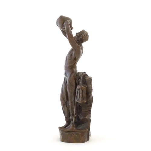 1100 - A 20thC cast sculpture after Richard Aurili, depicting a miner drinking from a water vessel, with la... 