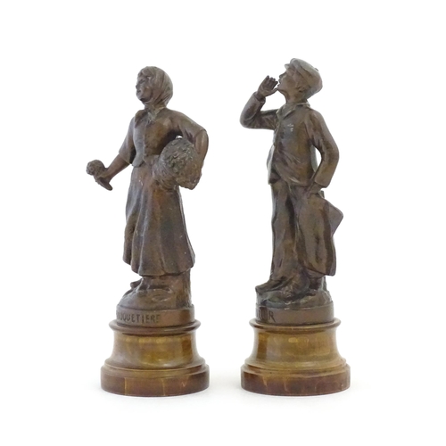 1102 - A pair of 20thC French spelter figures depicting street vendors comprising Flower seller and Newspap... 