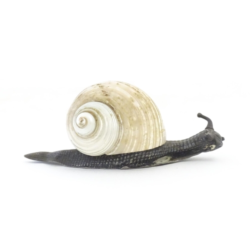 1109 - A late 19th / early 20thC WMF Art Nouveau paperweight by modelled as a snail with a silver plate bod... 