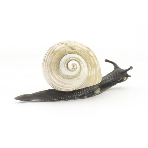1109 - A late 19th / early 20thC WMF Art Nouveau paperweight by modelled as a snail with a silver plate bod... 