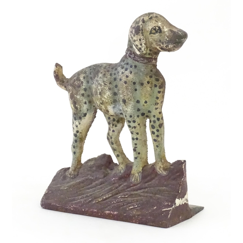 1111 - A noevlty cast iron doorstop modelled as a Dalmatian dog with a red collar. Approx. 8