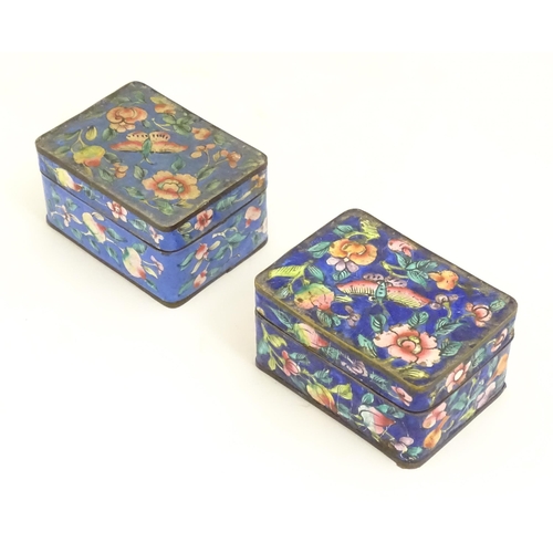 1129 - Two Oriental cloisonne boxes of rectangular form decorated with flowers, foliage and butterflies. Ap... 