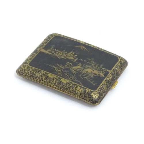 1150 - A Japanese Damascene cigarette case decorated with a river landscape scene with figures, Torii gate,... 