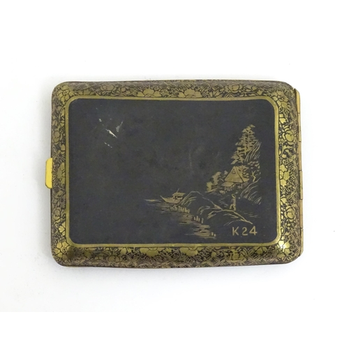 1150 - A Japanese Damascene cigarette case decorated with a river landscape scene with figures, Torii gate,... 