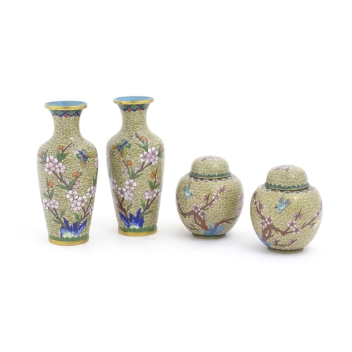 1153 - Four items of 20thC Chinese cloisonne ware to include a pair of vases and a pair of ginger jars, the... 