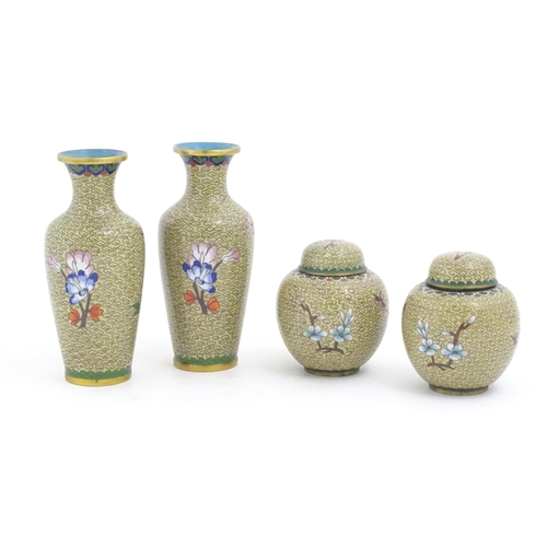 1153 - Four items of 20thC Chinese cloisonne ware to include a pair of vases and a pair of ginger jars, the... 