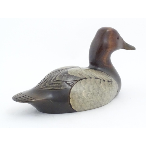 1168 - Shooting Interest: A 20thC American carved hardwood decoy duck by Craig Fellows designed exclusively... 