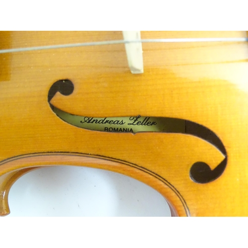 1174 - Musical Instrument: a 20thC violin, bearing label to the interior: ' Made in the workshops of Andrea... 