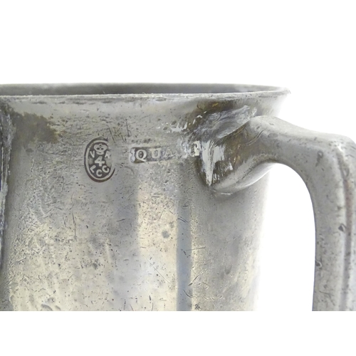 1191 - Two Victorian pewter measure jugs of tankard form, marked pint, and 1 quart, one by W. F. Loftus of ... 