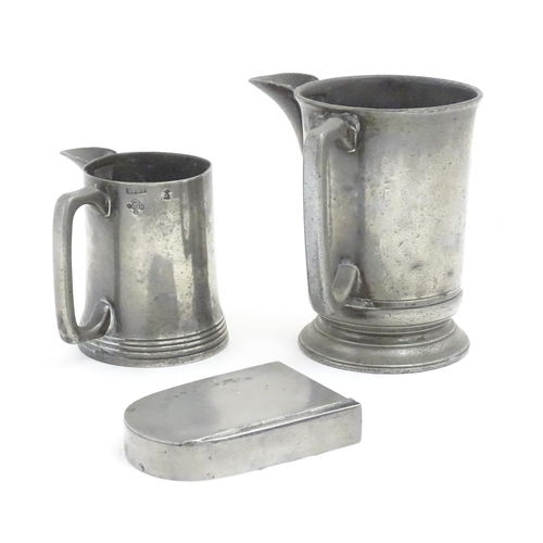 1191 - Two Victorian pewter measure jugs of tankard form, marked pint, and 1 quart, one by W. F. Loftus of ... 