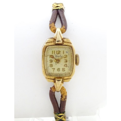 819 - A 9ct gold cased ladies wrist watch, the dial signed 'Verity' . Approx 1/