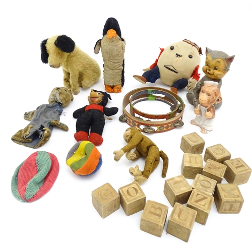 1453 - Toys: A quantity of assorted vintage toys, to include a Semco Mickey Mouse, an early 20thC straw fil... 