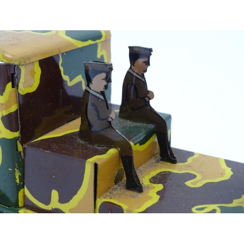 1456 - Toys: An early 20thC tin plate clockwork military vehicle with camouflage detail, two seated soldier... 