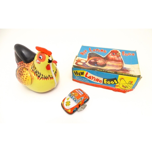 1462 - Toys: An early 20thC Lumar Toys tinplate Speed Trap clockwork game. Together with a Hen Laying Eggs ... 