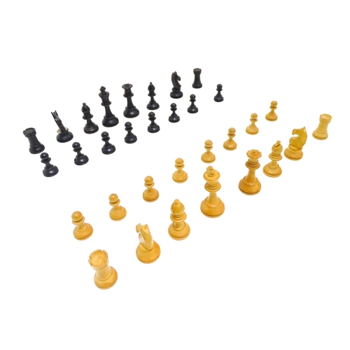 1463 - Toys: A quantity of chess pieces contained within a box with sliding lid and brass handle. (33 piece... 