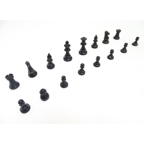 1467 - Toys: 20thC carved wood chess set. Together with an 8x8 Draughts games board. King approx. 2 1/2