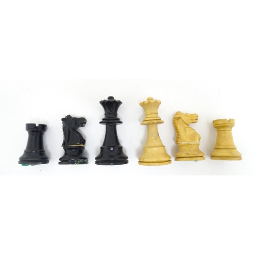 1467 - Toys: 20thC carved wood chess set. Together with an 8x8 Draughts games board. King approx. 2 1/2