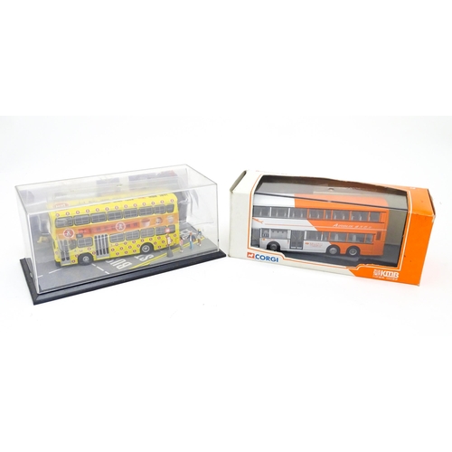 1479 - Toys: A quantity of assorted die cast scale model Corgi Far Eastern Buses to include KMB Christmas O... 