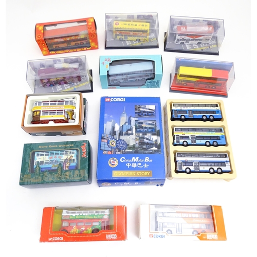 1479 - Toys: A quantity of assorted die cast scale model Corgi Far Eastern Buses to include KMB Christmas O... 