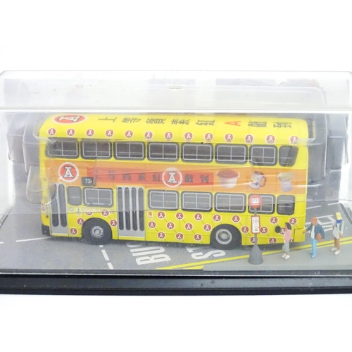 1479 - Toys: A quantity of assorted die cast scale model Corgi Far Eastern Buses to include KMB Christmas O... 