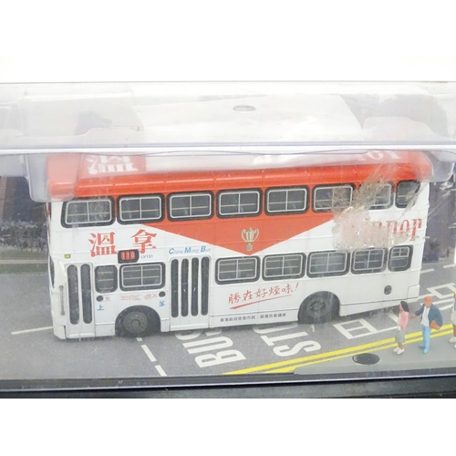 1479 - Toys: A quantity of assorted die cast scale model Corgi Far Eastern Buses to include KMB Christmas O... 