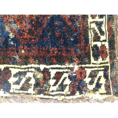 1531 - Rug : A woollen saddle bag style rug.  Approx. 46